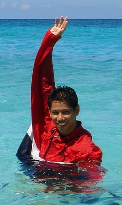 Lifeguard signals arms sideways all clear